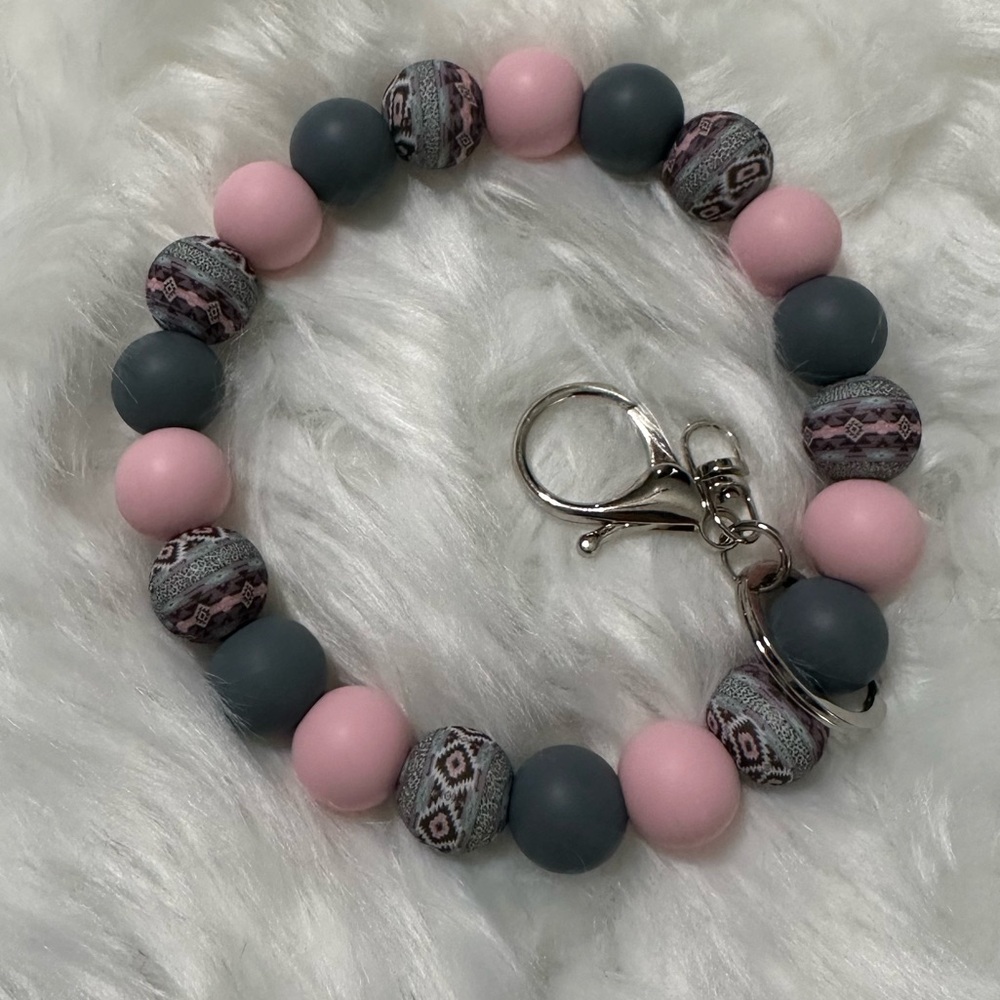 Pink and gray Aztec wristlet
